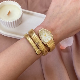 gold yılan model tasarım saat