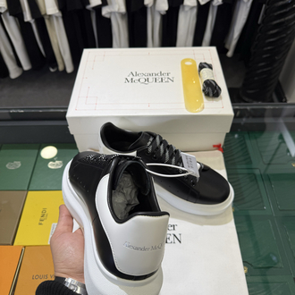 Alexander McQueen Sneaker in Black Leather with White Heel Tab