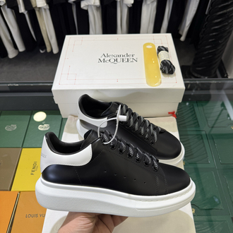 Alexander McQueen Sneaker in Black Leather with White Heel Tab