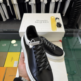 Alexander McQueen Sneaker in Black Leather with White Heel Tab