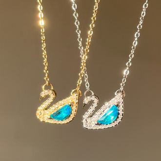çelik swarovski dazzling swan mavi taşlı gold kolye 