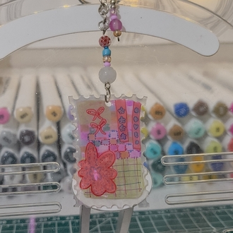 Pembe pul anahtarlık