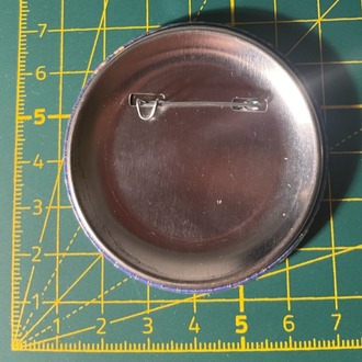 The Vigilante Rozet Pin (52 mm çap)
