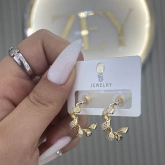 Gold kıvrımlı halka küpe