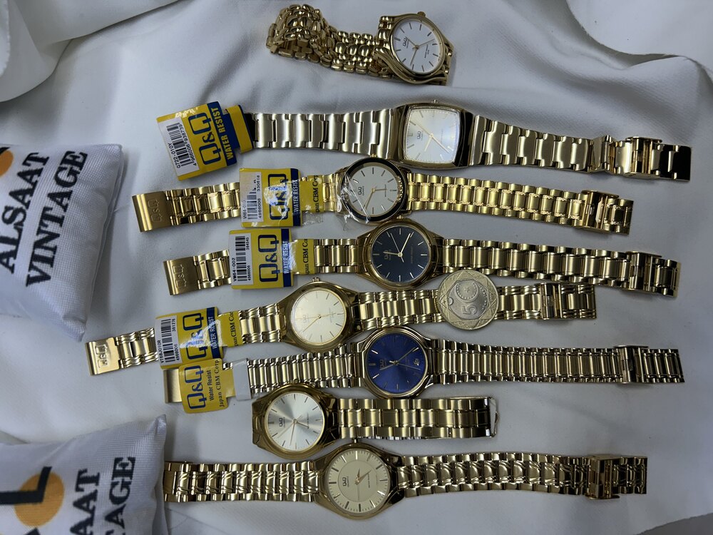 Q&Q gold renk kol saatleri 