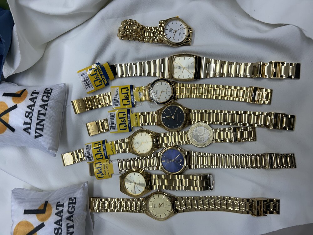 Q&Q gold renk kol saatleri 