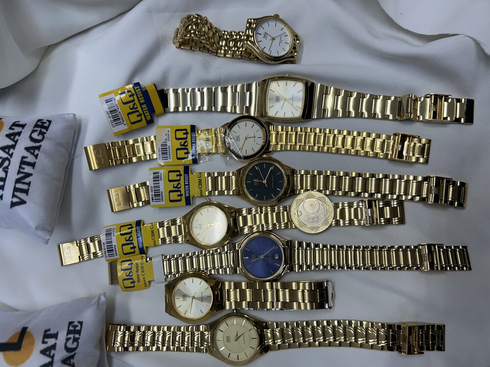 Q&Q gold renk kol saatleri 