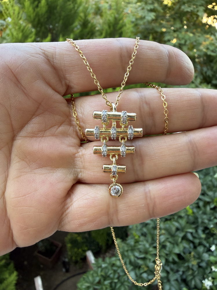 Geometrik Formlu Zirkon Taşlı Gold Çelik Kolye