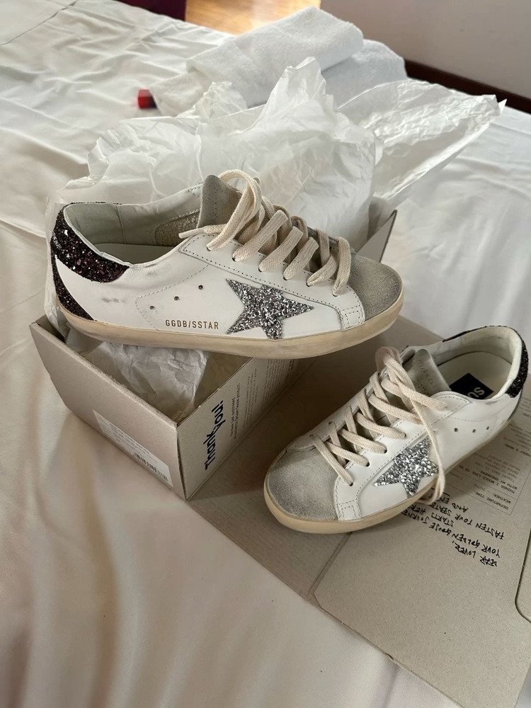 Golden Goose Super-Star with silver star and black glitter heel tab
