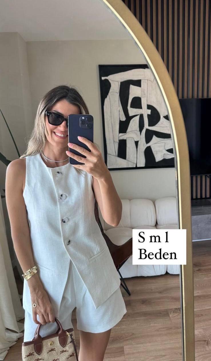 Beyaz yelekli sort takim