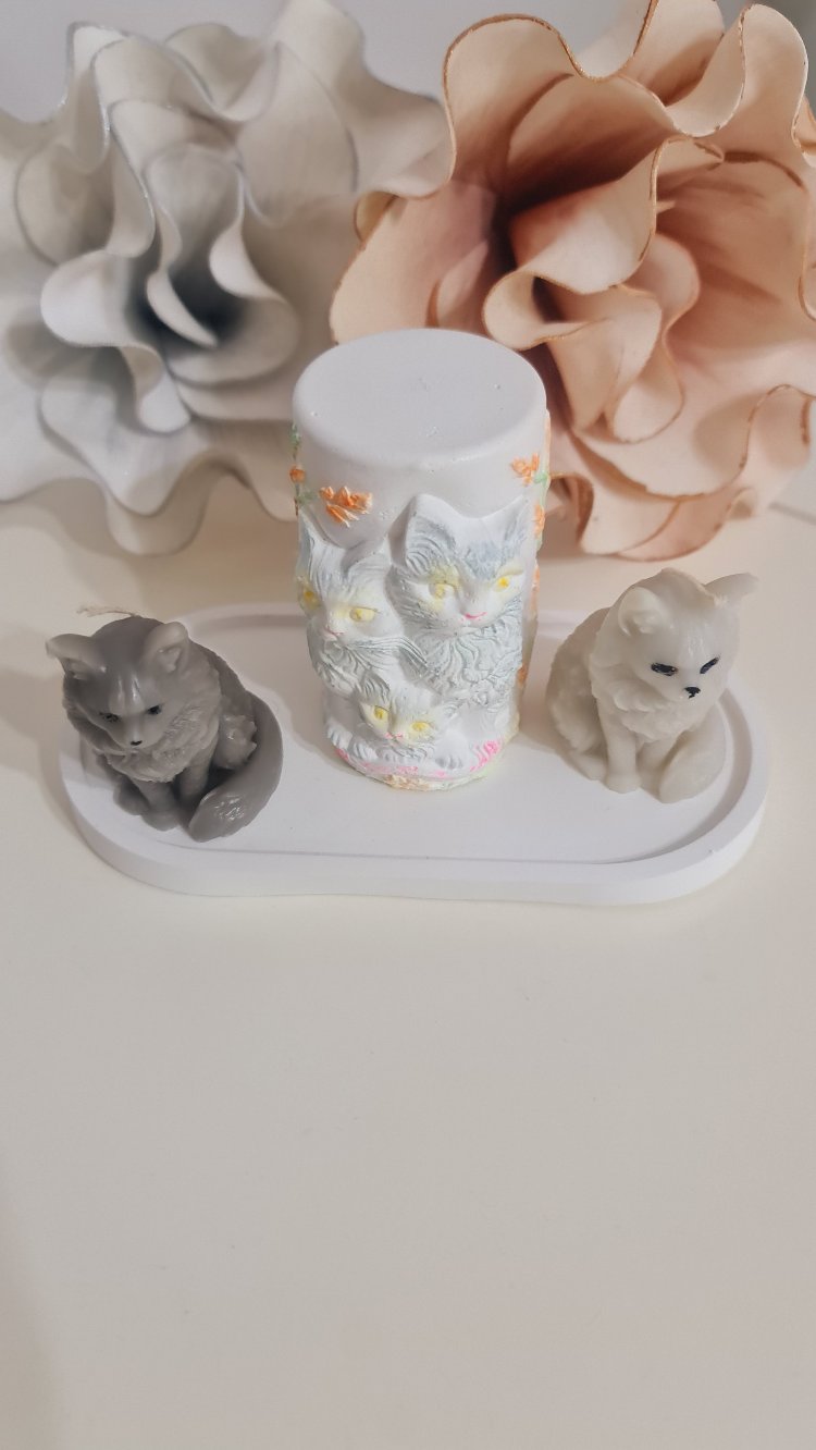 2 adet mum kedi,1 adet alçı tabak, 1 adet alçı kedi ailesi figür 