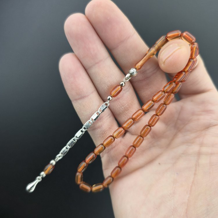 Bilek Boy, Kapsül, Ateş Kehribar