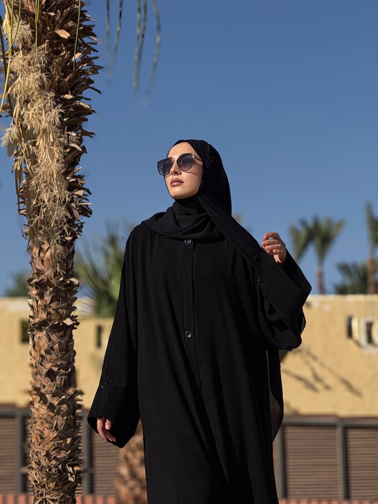 Trenç abaya