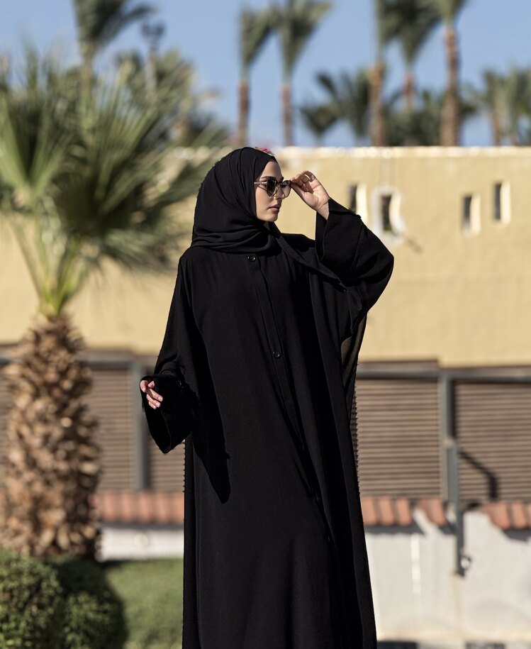 Trenç abaya