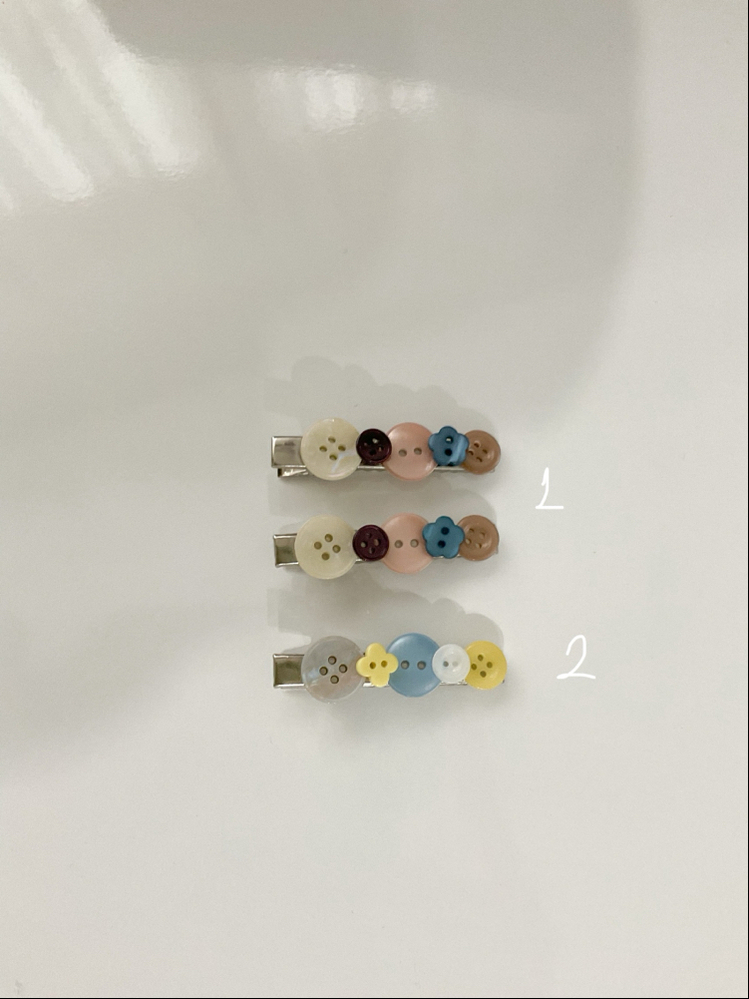 Button hair clips