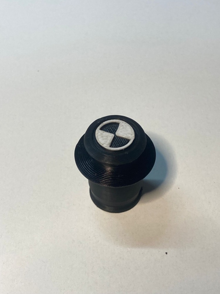 BMW arka koltuk çakmaklık tapası