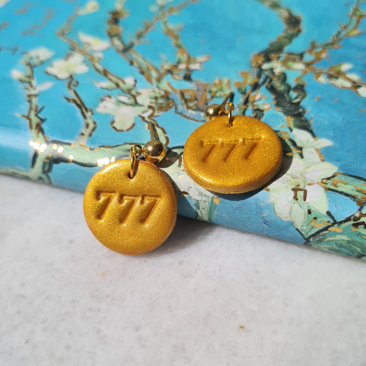 777 Manifest Küpe