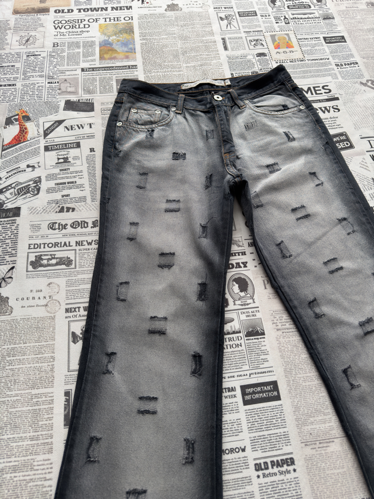 Taşlamalı Yırtık Detaylı Kot Pantolon