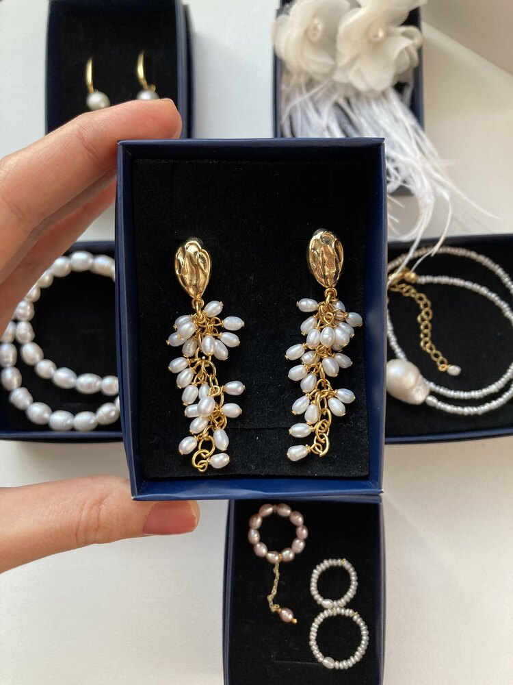 A Bunch Of Pearl Earrings