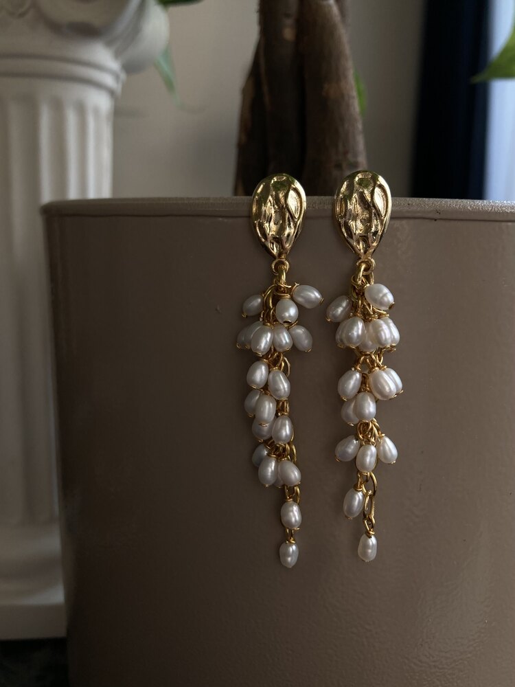 A Bunch Of Pearl Earrings