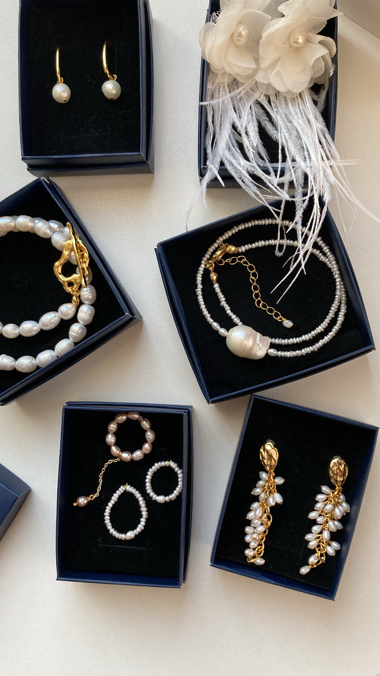 A Bunch Of Pearl Earrings