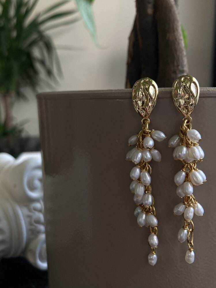 A Bunch Of Pearl Earrings