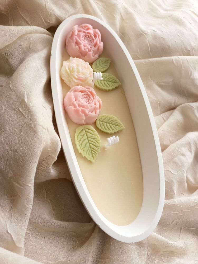 pembe çiçek yapraklı soya mum