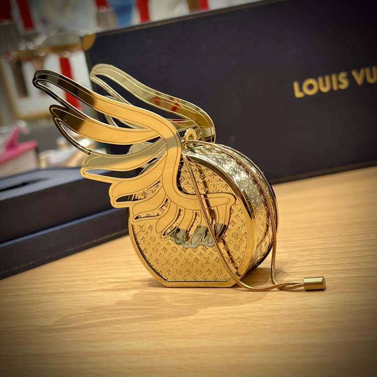 Louis Vuitton 'Le Voyage Des Lumières' Christmas Ornament Flying Trunk Set