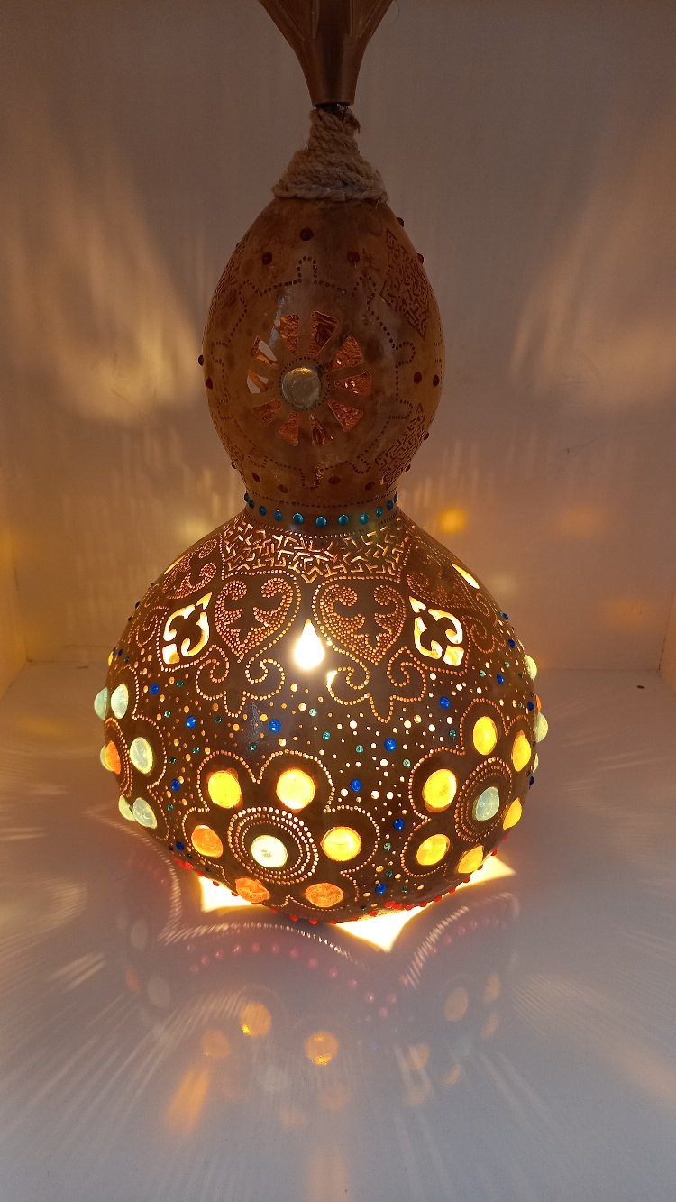 Osirisin gözü su kabağı lambası
