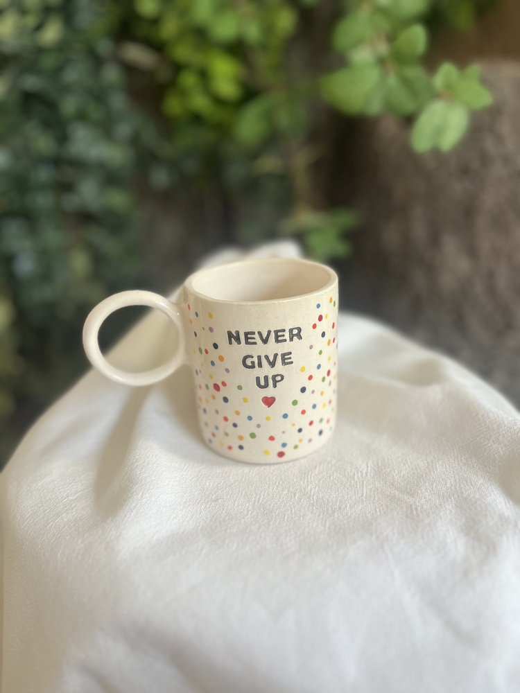 Never Give Up Mottolu Kupa