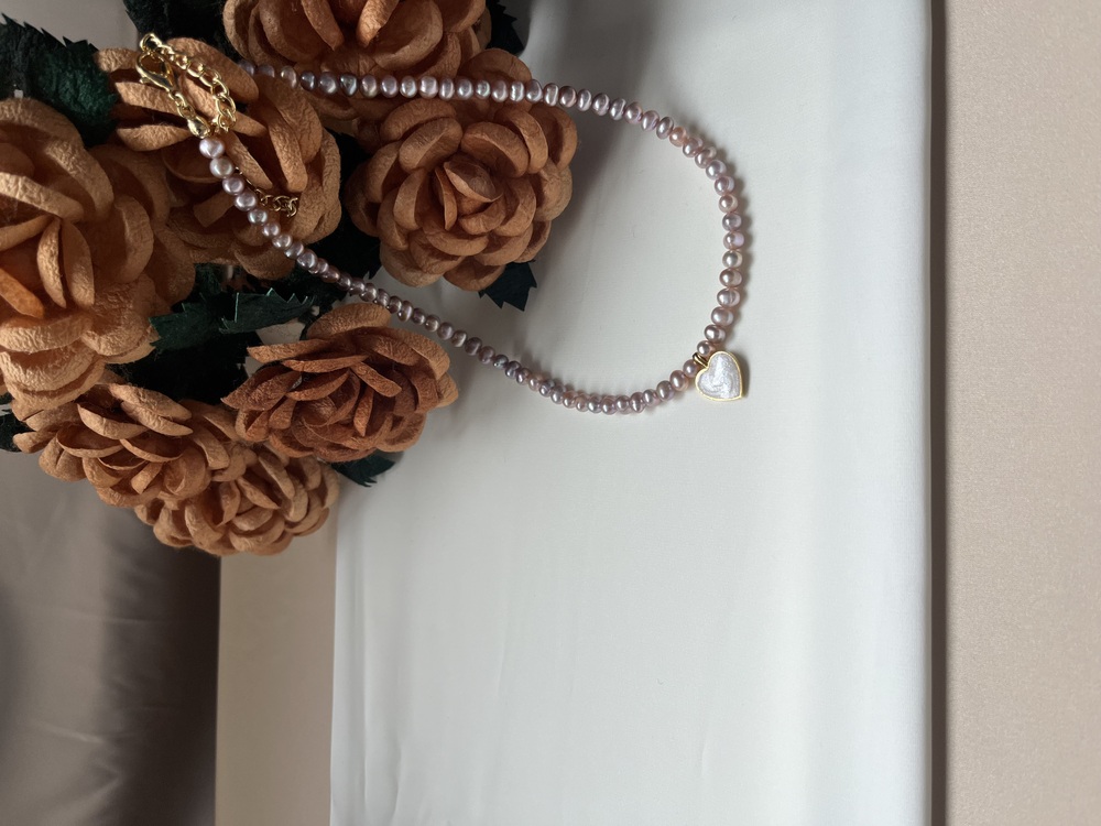The Enamelled Shine Of Lavender Pearl Love Necklace