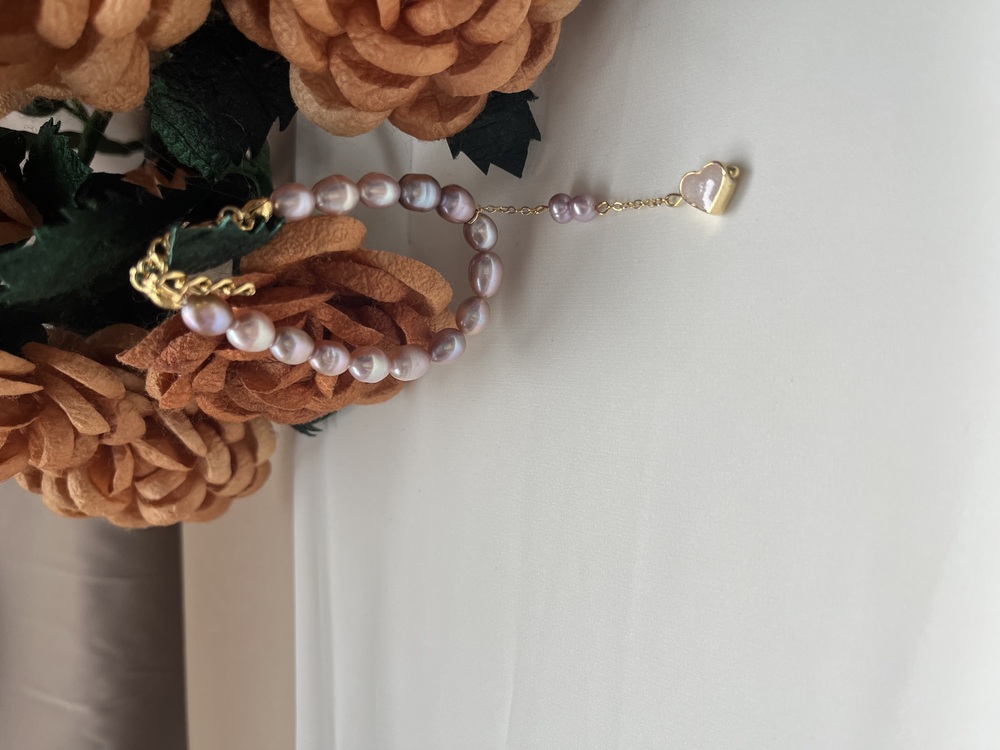 The Enamelled Shine Of Lavender Pearl Love Bracelet