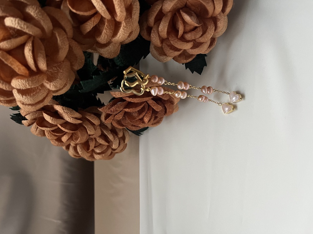 The Enamelled Shine Of Peach Pearl Love Earrings