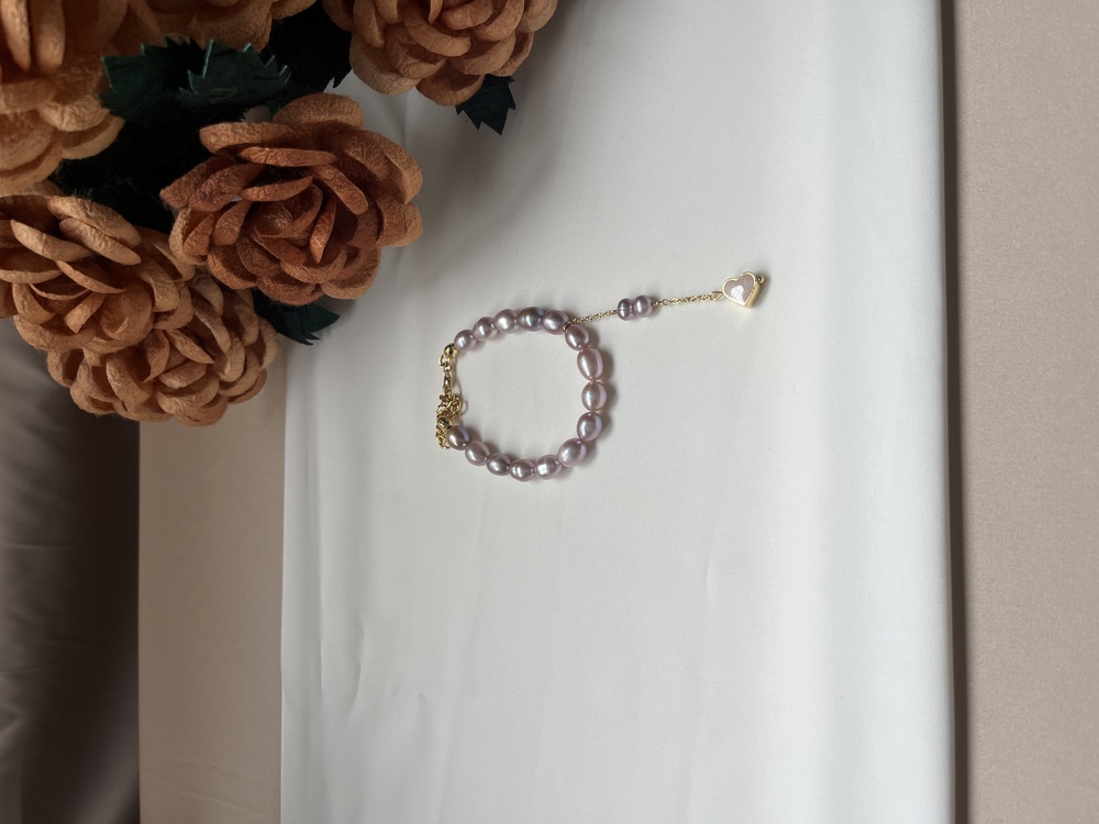 The Enamelled Shine Of Lavender Pearl Love Bracelet