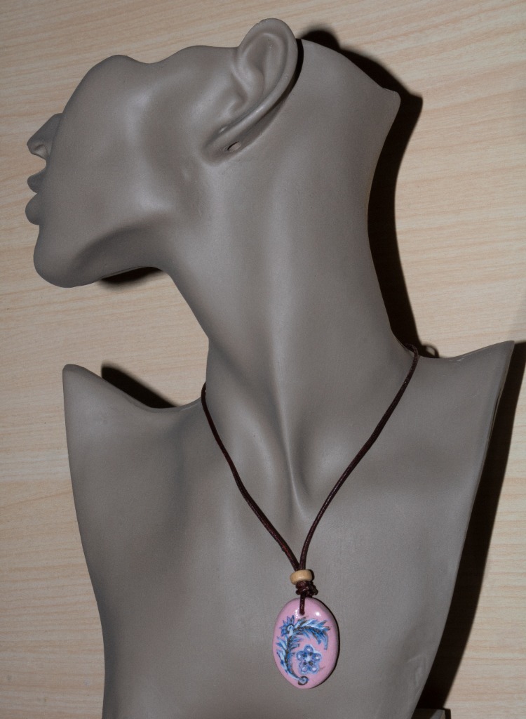 Handmade clay ornament amulet with genuine leather cord and wooden bead