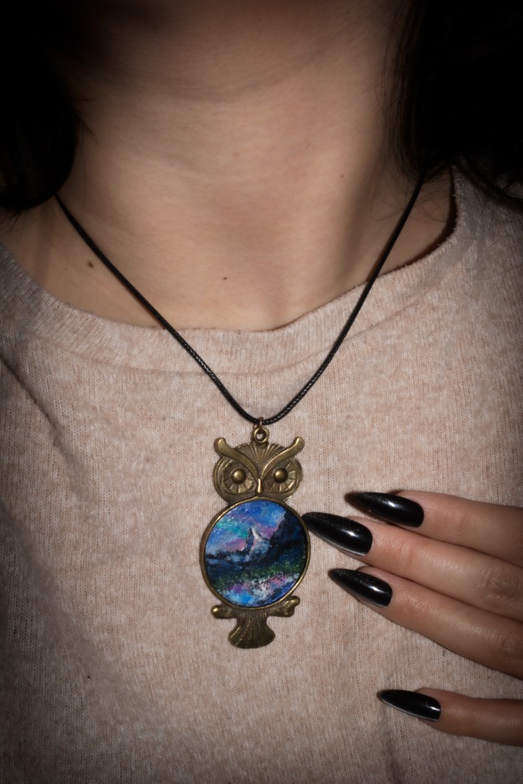 Hand-painted aurora borealis & mountain lake amulet in the shape of an owl