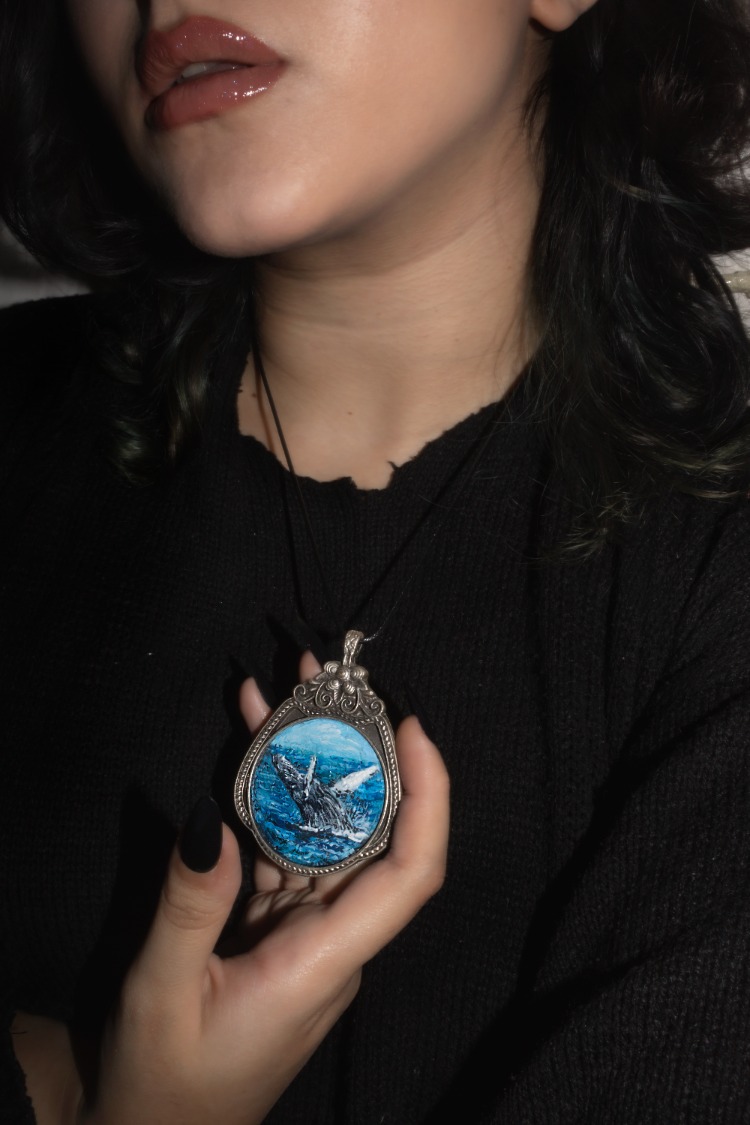 Hand-painted miniature whale amulet
