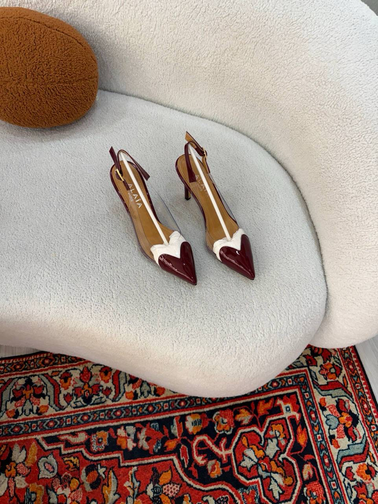  ALAÏA LE CŒUR SLINGBACKS IN PATENT LAMBSKIN