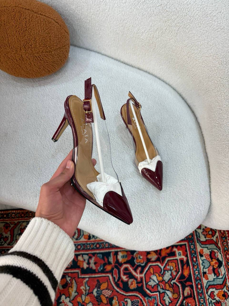  ALAÏA LE CŒUR SLINGBACKS IN PATENT LAMBSKIN