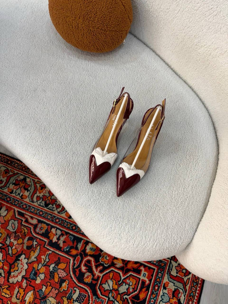  ALAÏA LE CŒUR SLINGBACKS IN PATENT LAMBSKIN