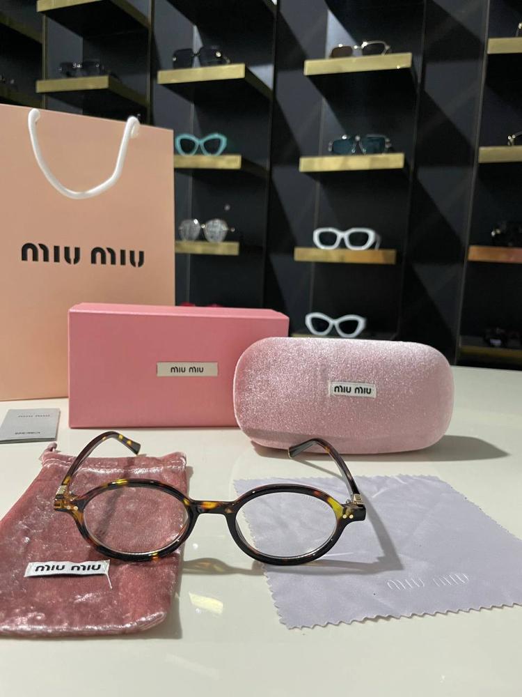 Miu Miu oval kadın leopar detaylı optik gözlük