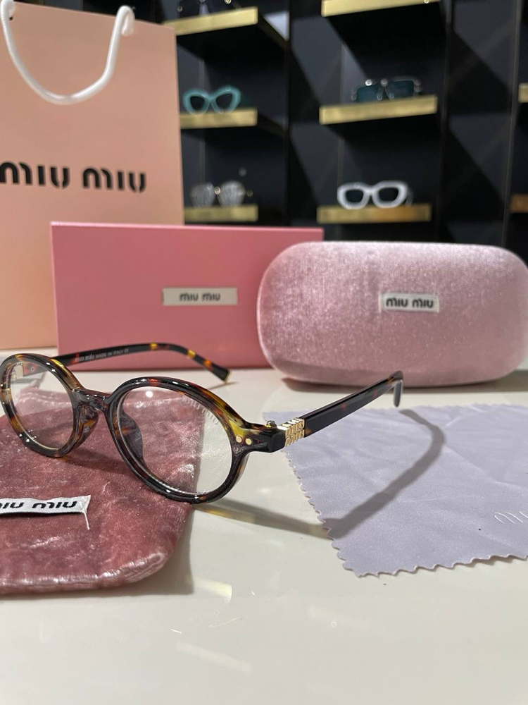 Miu Miu oval kadın leopar detaylı optik gözlük
