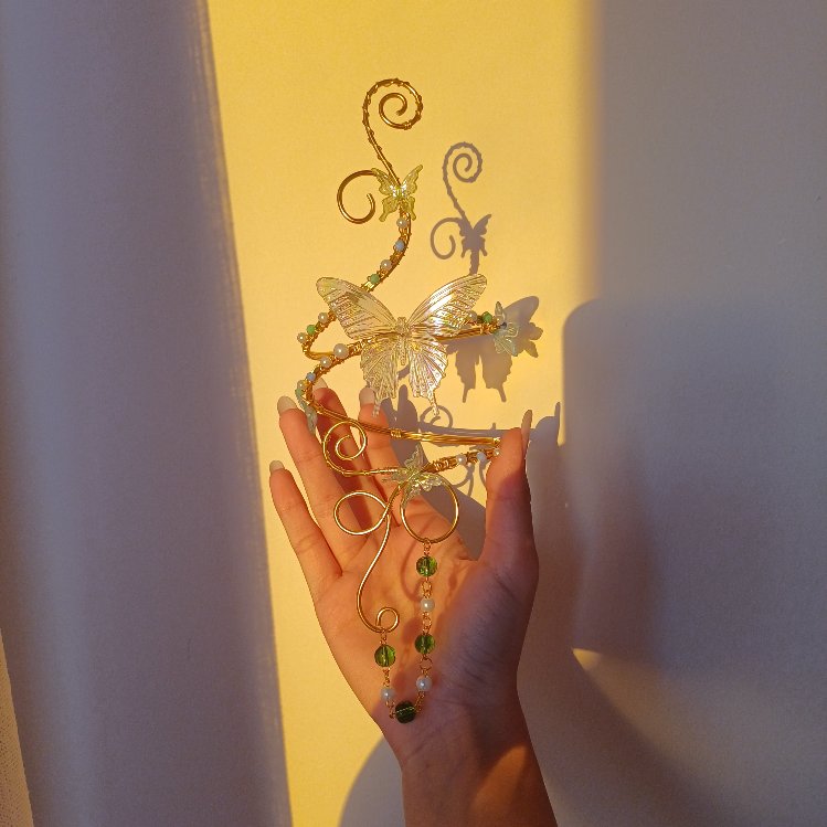 kelebekli arm cuff