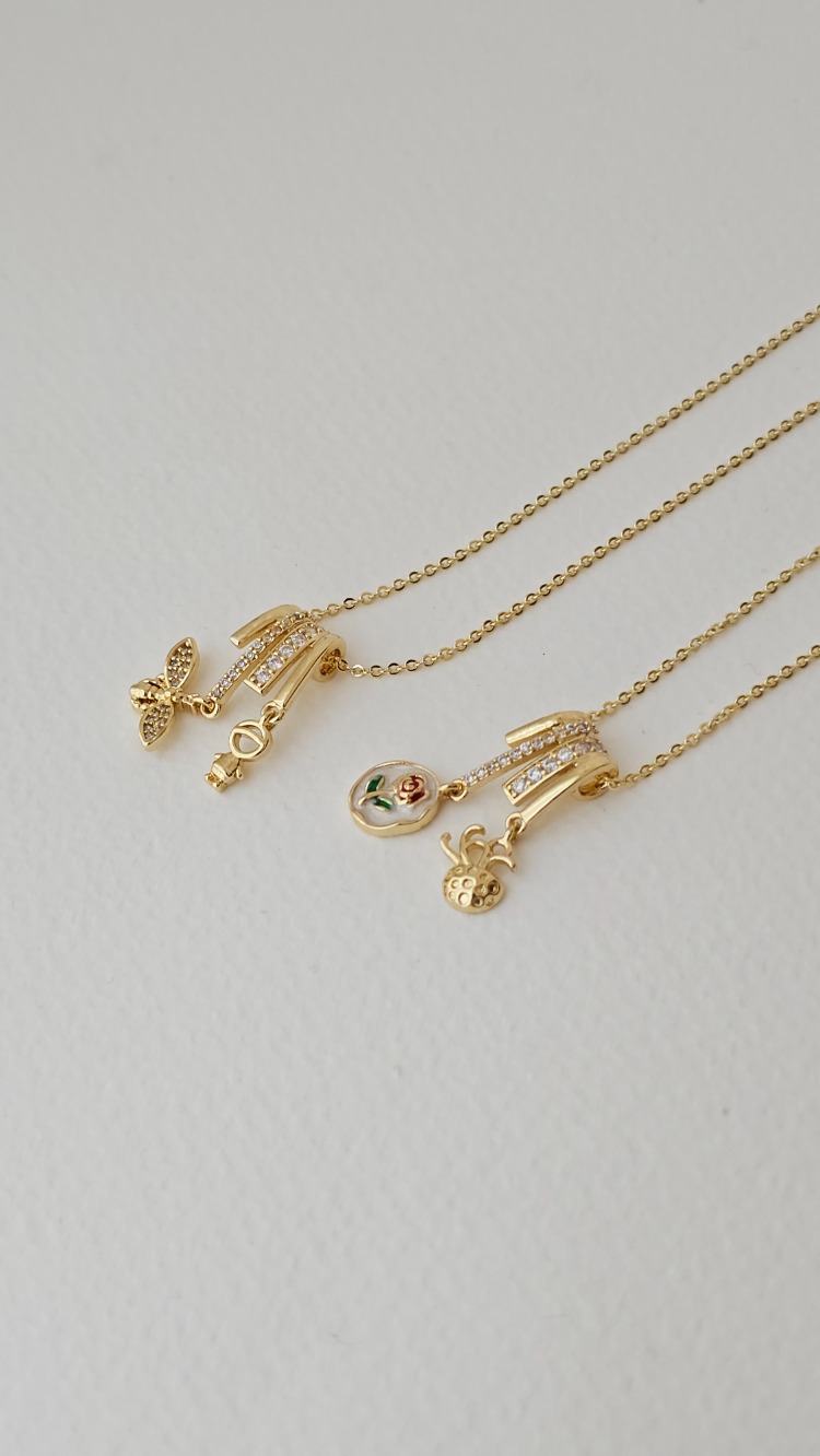 14k altın kaplama figürlü ve zirkon taşlı kolyeler