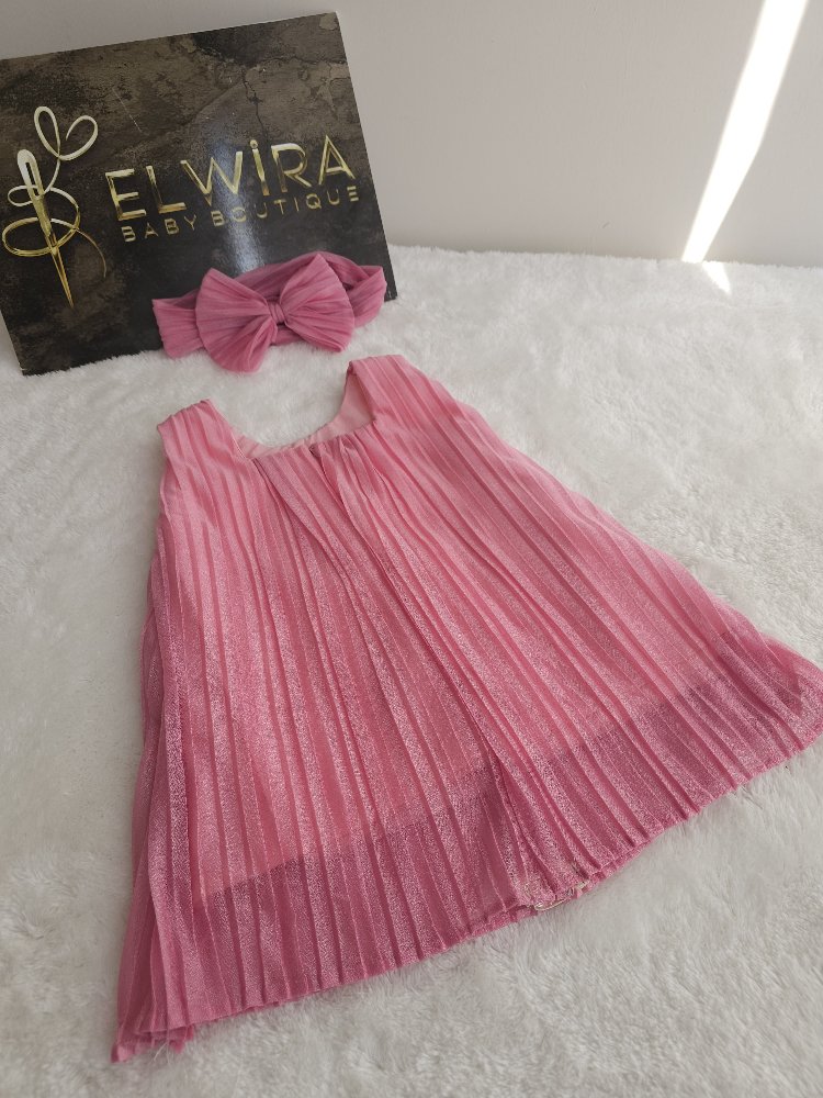 pembe pileli elbise