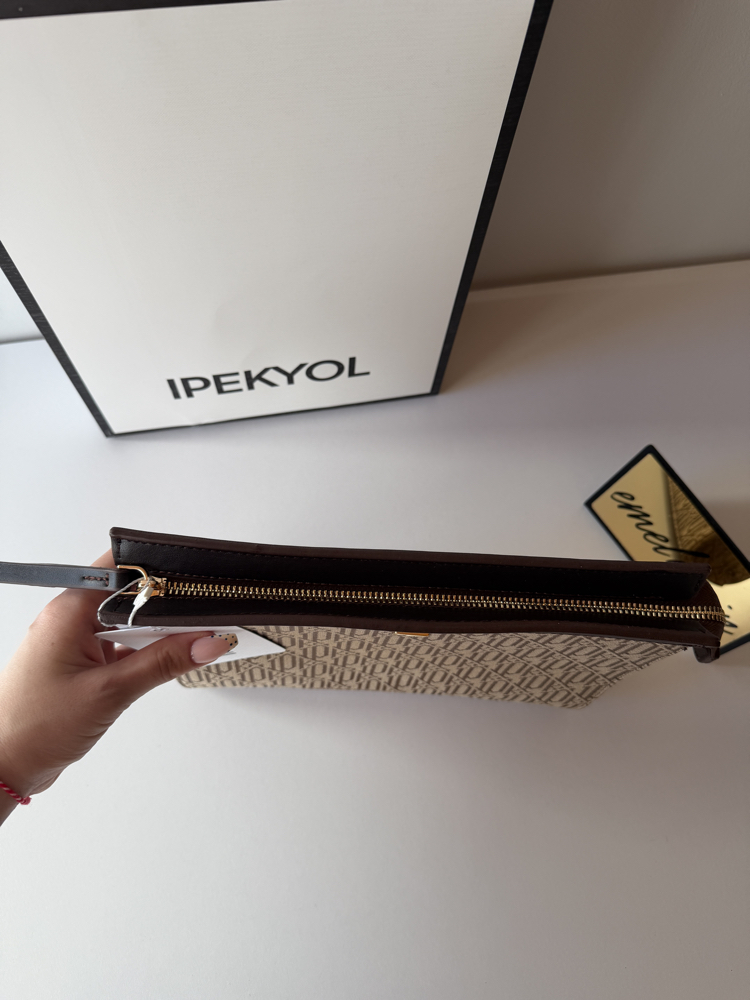 Mia Model Monogram Journey Clutch