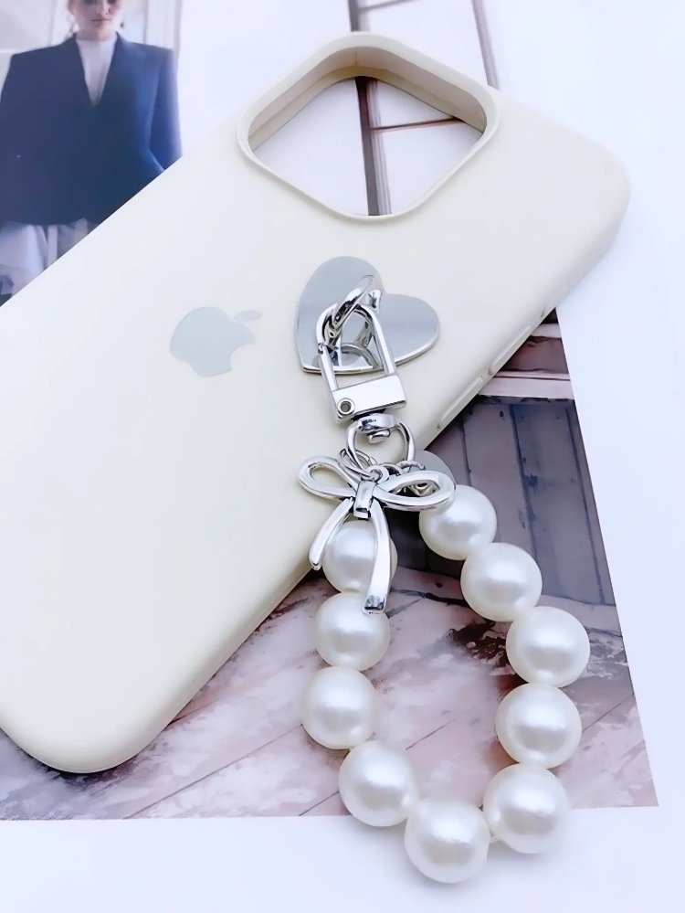 Coquette gümüş fiyonk detaylı ve cam incili çanta charmı