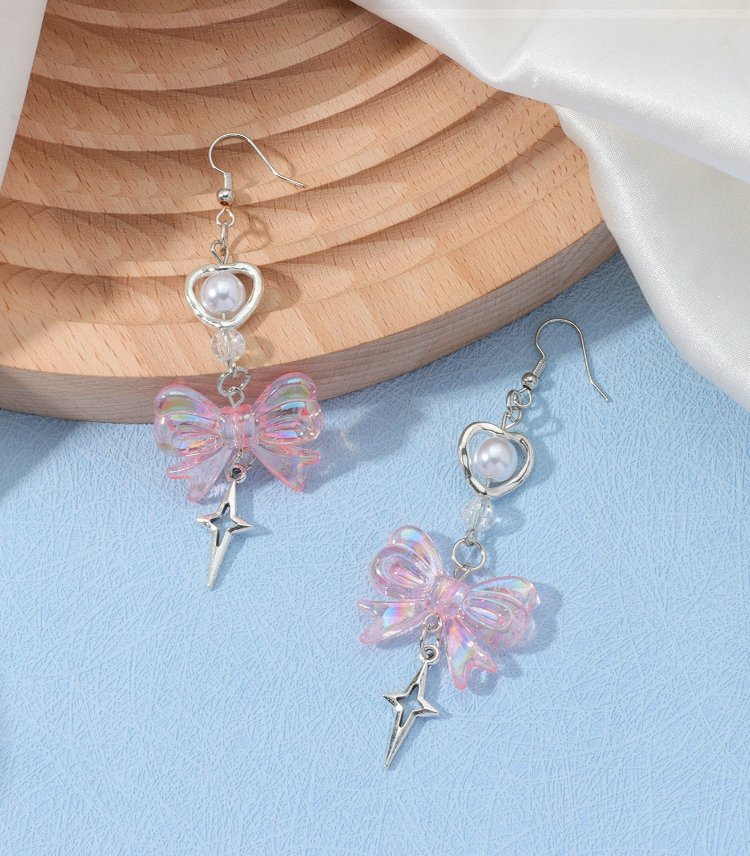 Coquette pembe fiyonk detaylı küpe