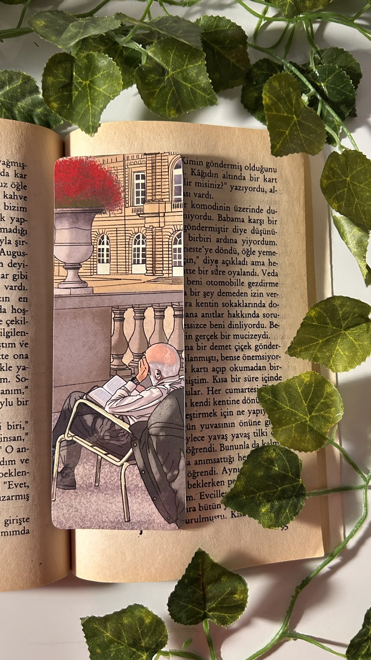 Kitap okuyan yaşlı adam temalı kitap ayracı