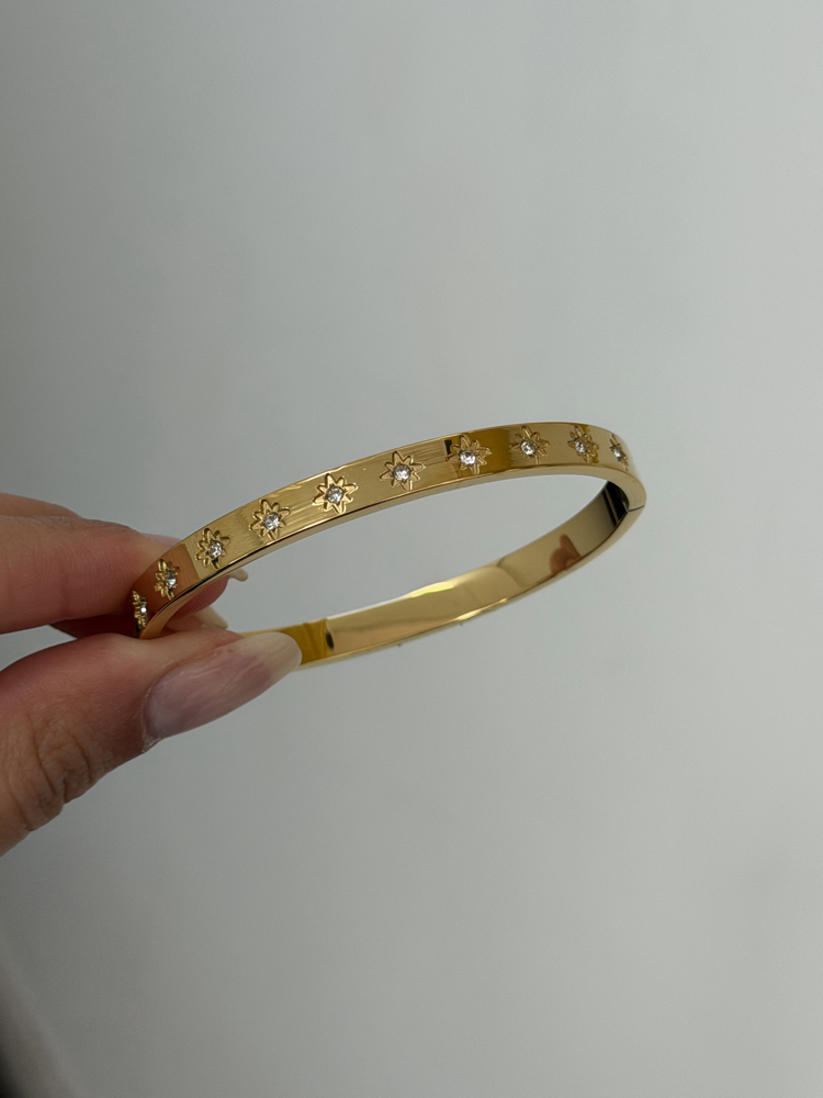 Çelik Kutup Yıldızı İşlemeli Kelepçe | Gold